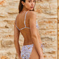 Back View Of Flirtt Floral Adjustable Side Tie Bikini Bottom | FLIRTT FLORAL WHITE