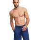 Front View Of Gottex Men 9-Inch Swim Trunks | GOTTEX MEN NAVY AND PETROL ACCENT