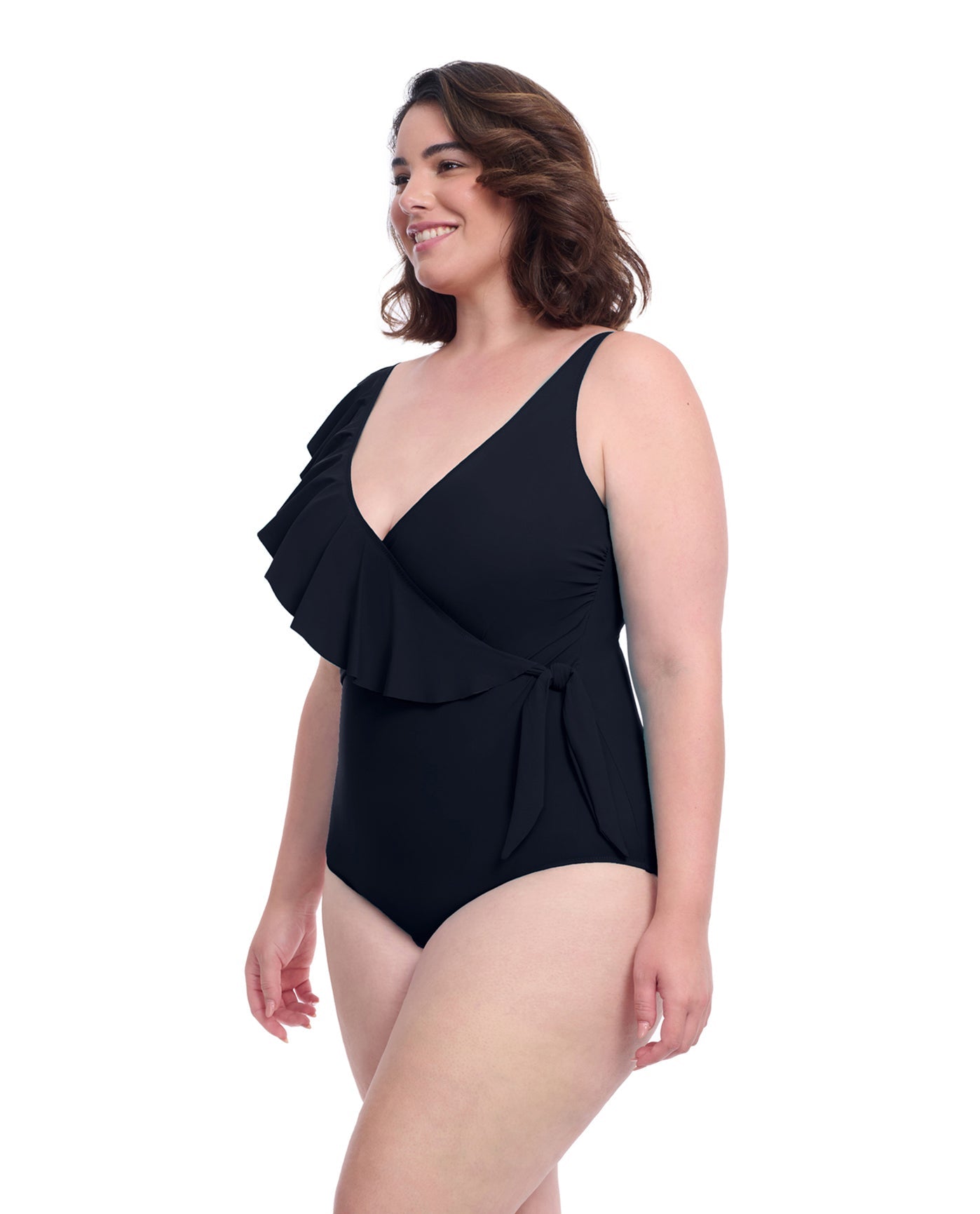 Side View of Profile By Gottex Tutti Frutti Plus Size Asymmetrical Ruffle Surplice One Piece Swimsuit | PROFILE TUTTI FRUTTI BLACK