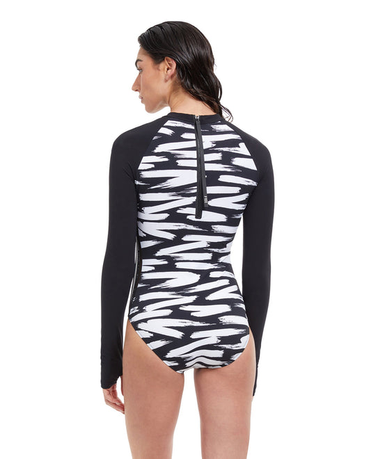 Back View Of Free Sport Upstream Long Sleeve High Neck Rash Guard One Piece Swimsuit | FREE SPORT UPSTREAM BLACK AND WHITE